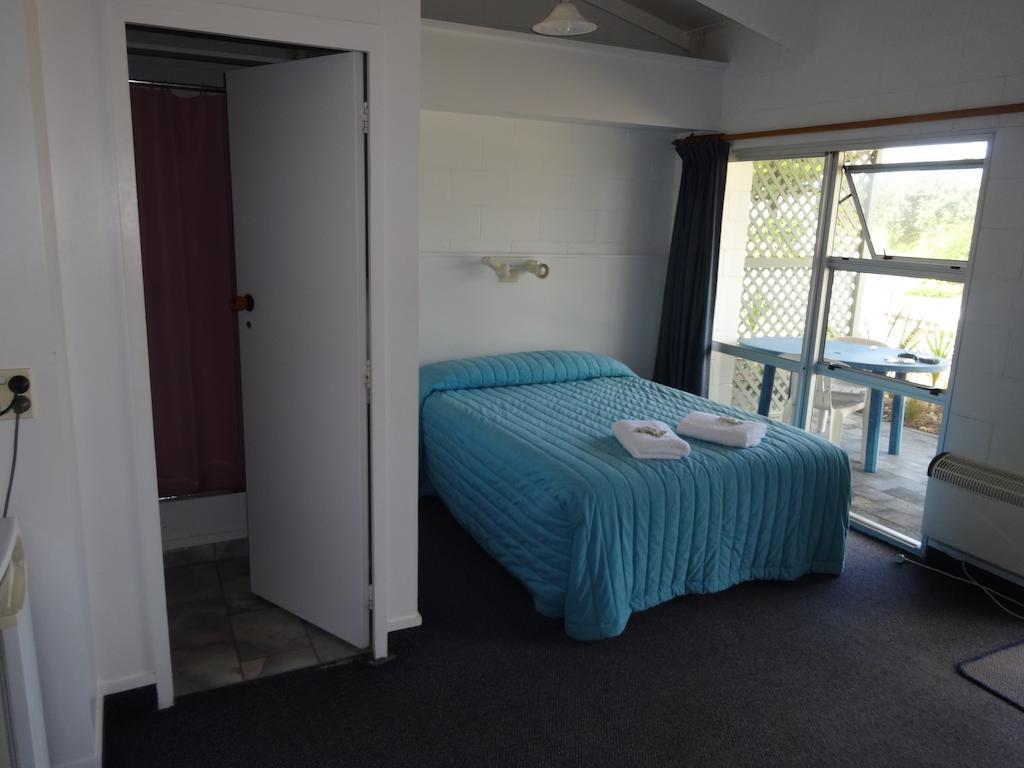 Ninety Mile Beach Holiday Park Waipapakauri Rom bilde