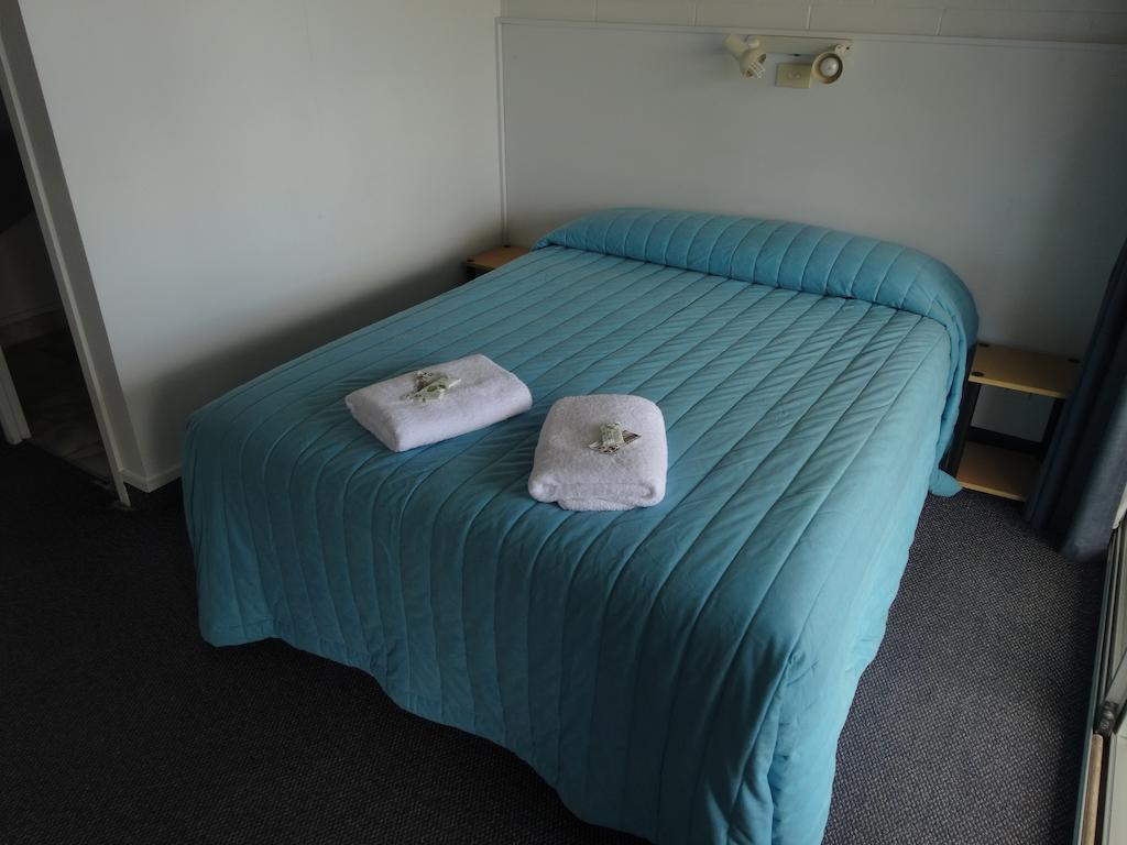 Ninety Mile Beach Holiday Park Waipapakauri Rom bilde