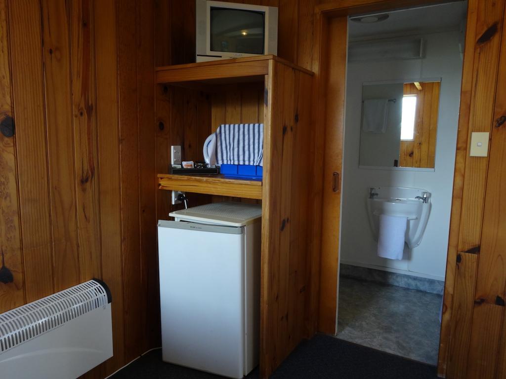 Ninety Mile Beach Holiday Park Waipapakauri Rom bilde