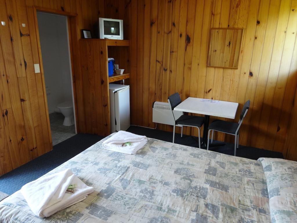 Ninety Mile Beach Holiday Park Waipapakauri Rom bilde