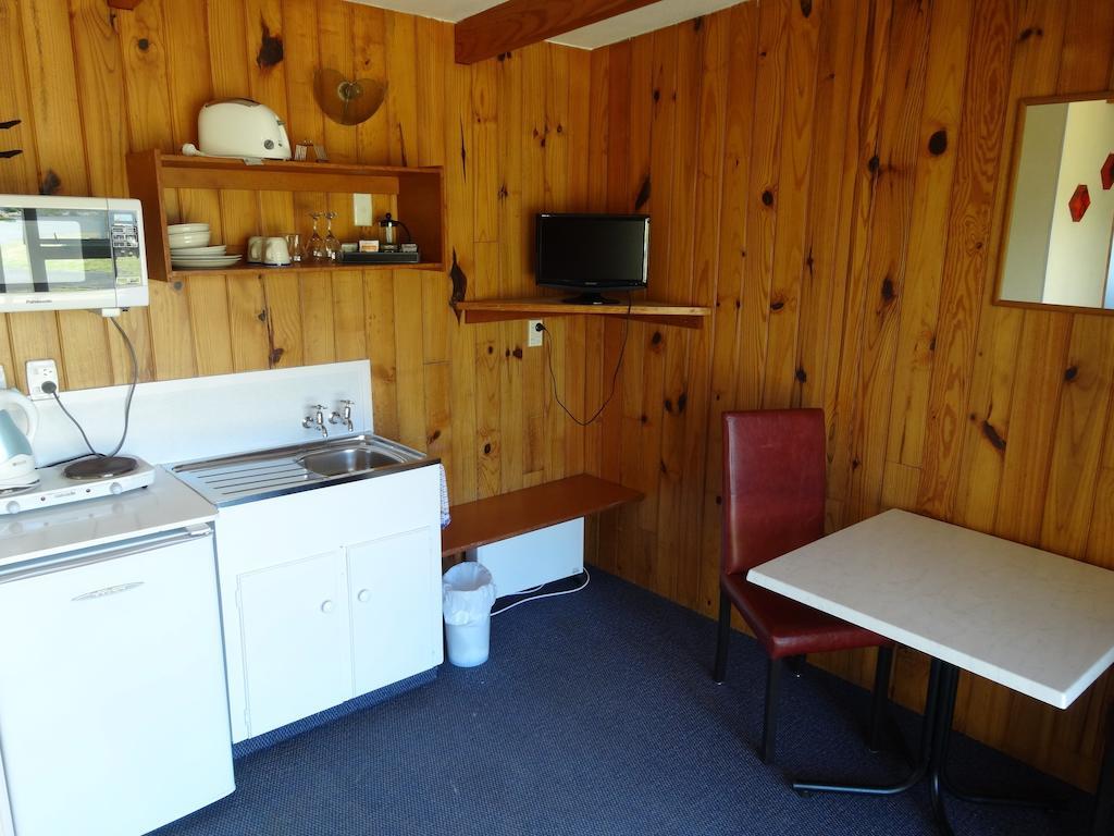 Ninety Mile Beach Holiday Park Waipapakauri Rom bilde