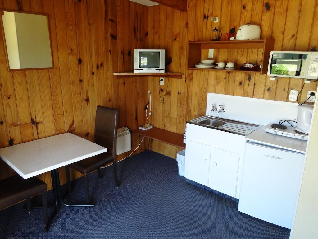 Ninety Mile Beach Holiday Park Waipapakauri Rom bilde