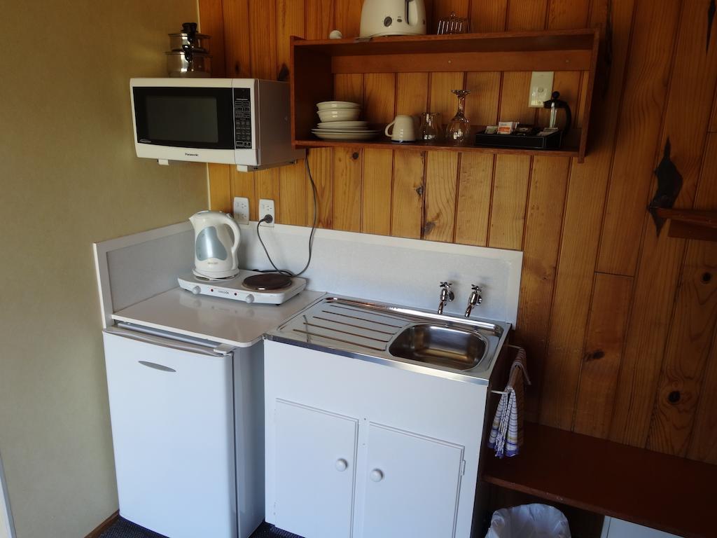 Ninety Mile Beach Holiday Park Waipapakauri Rom bilde