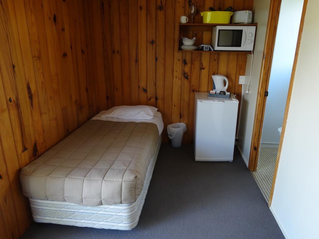 Ninety Mile Beach Holiday Park Waipapakauri Rom bilde